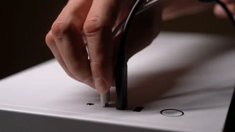 Closeup of man plugging type-c cable into white computer case, for data transfer Video stock 289903838