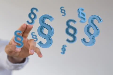 Closeup of a man pointing into 3D rendered paragraph section sign Stockfoto's