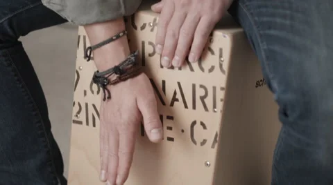 Closeup of man practising drum rhythms on wooden beat box Stock Footage 50245911