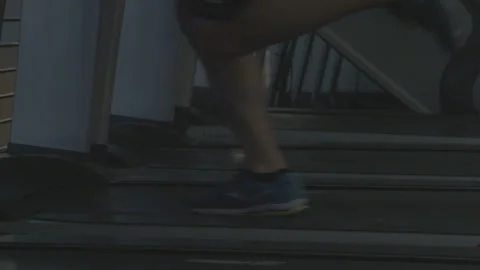 Closeup of a Man Running on a Treadmill Stock Footage 154003487