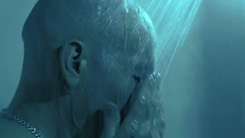 Closeup Man with Shaved Head Showering Stock Footage 235948171