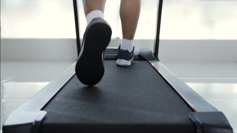 Closeup man shoes running exercise on treadmill. Stock Footage 125301084
