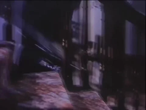 Closeup of man in spats walking down carpeted stairs, 1940s Vidéo 260258281