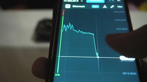 Closeup of a man using his smartphone mobile device to scroll through the Stock Stock Footage 155352192