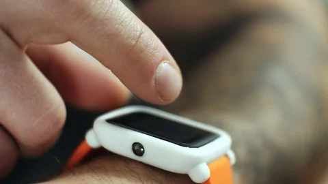 Closeup Of Man using His Smartwatch Stock-Footage 106256999