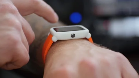 Closeup Of Man using His Smartwatch Stock Footage 106257060