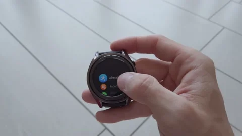 Closeup Of Man Using His Smartwatch on Wooden Background Stock-Footage 130341038