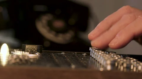 Closeup of a man using an WWII enigma code machine Stock Footage 263769270