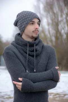 Closeup of man in warm clothing standing against sky Stock Photos