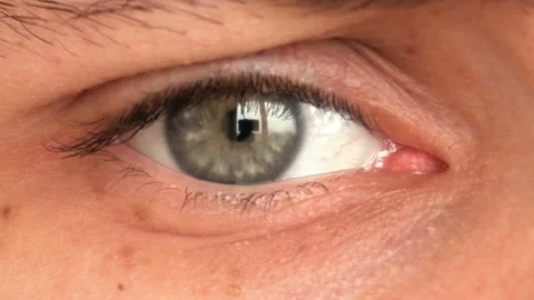 Closeup of man's eye moving looking around Stock Footage 88164676