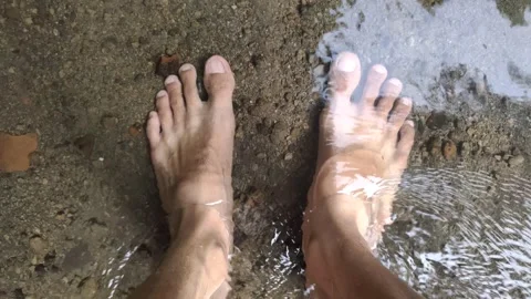 A Closeup of A Man's Feet in A River Stock-Footage 324350505