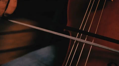 Closeup of man's hand playing cello. Stock Footage 149666734