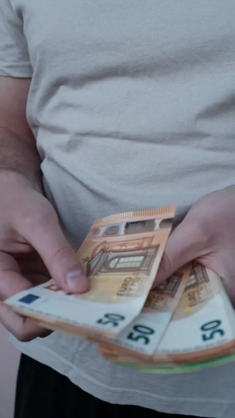 Closeup of man's hands counting euro cash banknotes. Stock Footage 316920424