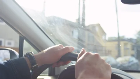 Closeup Of Man's Hands On Steering Wheel, Taps On Steering Wheel To Beat Of Song Stock Footage 90147467