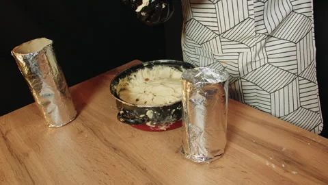 Closeup of manual dessert shaping in rustic kitchen environment Video stock 330536851