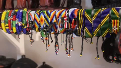 Closeup of many hand braslets hanged for sell Stock Footage 162974022