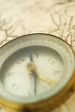 Closeup of a map and compass Fotos de archivo