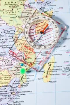 Closeup map and compass Stock Photos