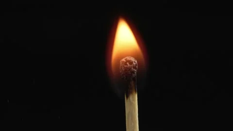 Closeup Match burning and combusting on ... | Stock Video | Pond5
