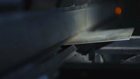 Closeup of metal part which is inserted into the CNC to bend the metal Stock Footage 170224852