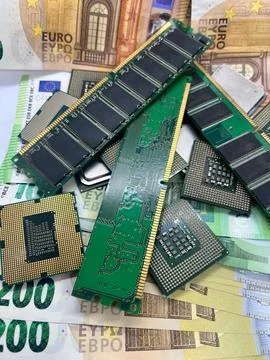 Closeup of microprocessors CPU RAM memory sticks on Euro banknotes 200EUR 5.. Stock Photos