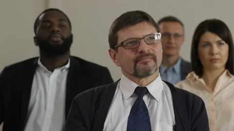 Closeup middle aged man listens to public speaker Stock Footage 108007251