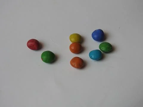 Closeup of Mini Choco gems - Choco flavour colorful Beans and plastic contain Stock Photos