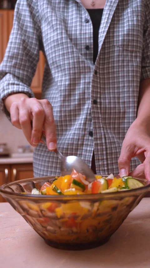 Closeup of mixed vegetables being prepared with bright lighting Stock Footage 329062966