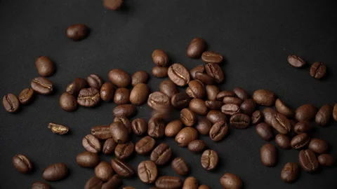 Closeup of Mocha Coffee Beans, Fall and Bounce on the Table Stock Footage 168330327