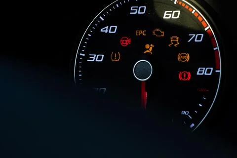 Closeup of a modern dashboard display featuring a variety of illuminated gauges 스톡 사진
