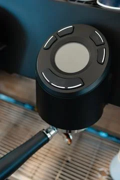 CloseUp of a Modern Espresso Machine Button, showcasing its features and design Stock Photos