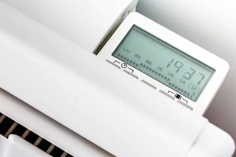 Closeup of modern radiator with digital timer High angle closeup of modern... Stock Photos
