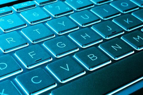 Closeup of a modern silver laptop computer keyboard. Laptop keyboard. Detai.. Foto stock