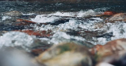 Closeup of mountain river rocks with heavy water flow Stock Footage 121044479