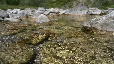 Closeup of a mountain stream in summer (slow motion) Stock-Footage 260844817