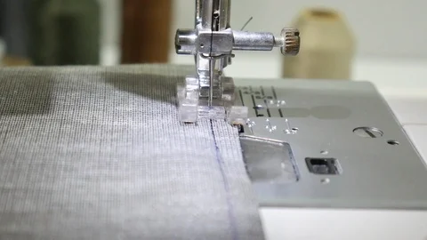Closeup of moving needle of sewing machine Video stock 101035531
