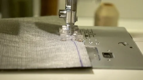 Closeup of moving needle of sewing machine Stock Footage 101035550