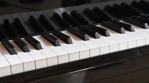 Closeup of moving piano keys on automatic play Video stock 333718067