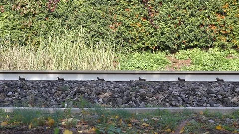 Closeup of the moving train and the railroad Stock Footage 70770897