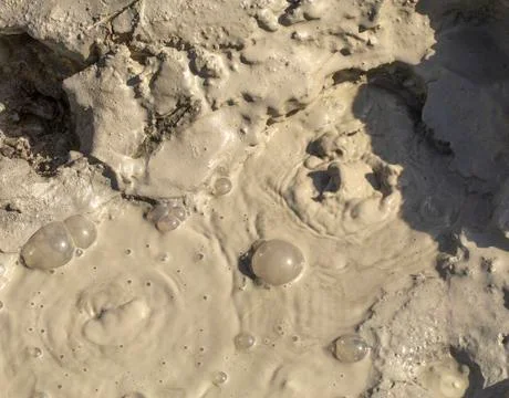 The Closeup of a Mud Volcano or Mud Dome on Kamchatka Stock Photos