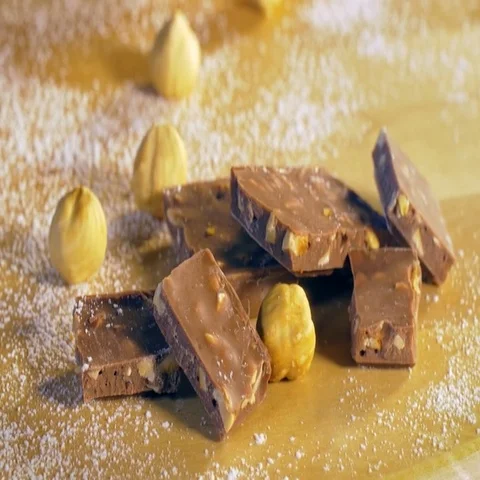Closeup of a muffing with chocolate and hazelnuts. Stock Footage 69584989
