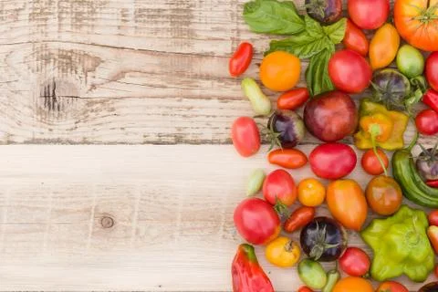 Closeup of multi-colored fresh organic vegetables: paprika, tomatoes, and her Stock Photos
