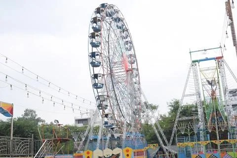 Closeup of multi-coloured Giant Wheel during Dussehra Mela in Delhi, India... Stock Photos
