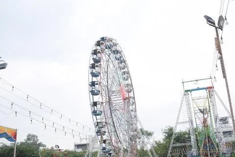 Closeup of multi-coloured Giant Wheel during Dussehra Mela in Delhi, India... Stock Photos