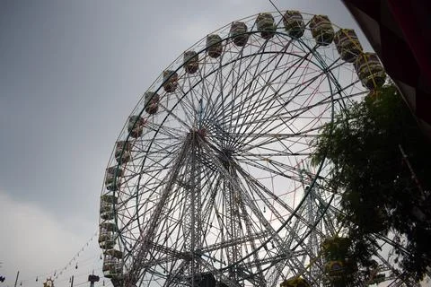 Closeup of multi-coloured Giant Wheel during Dussehra Mela in Delhi, India... Stock Photos
