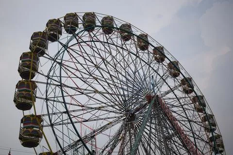 Closeup of multi-coloured Giant Wheel during Dussehra Mela in Delhi, India... Stock Photos
