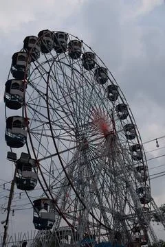 Closeup of multi-coloured Giant Wheel during Dussehra Mela in Delhi, India... Stock Photos