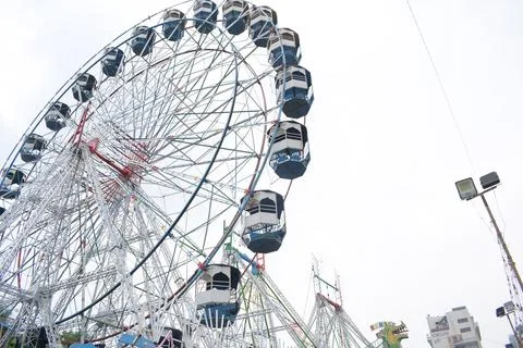 Closeup of multi-coloured Giant Wheel during Dussehra Mela in Delhi, India... Stock Photos