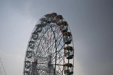Closeup of multi-coloured Giant Wheel during Dussehra Mela in Delhi, India... Stock Photos