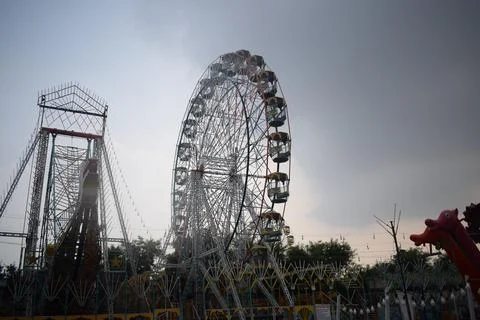Closeup of multi-coloured Giant Wheel during Dussehra Mela in Delhi, India... Stock Photos